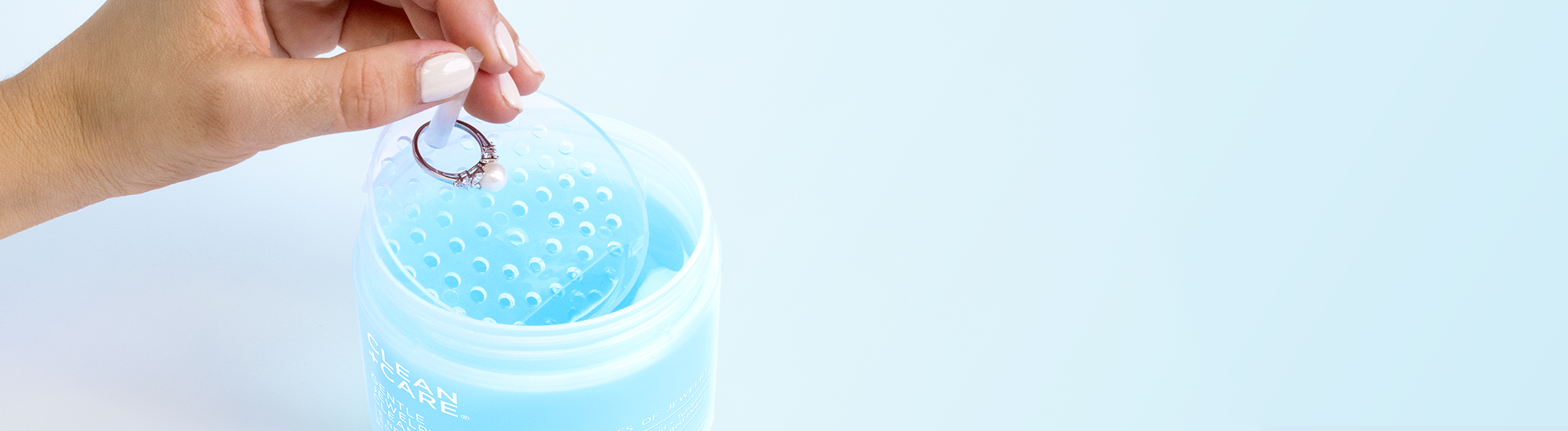 clean and care gentle cleaner formula dipping jewelry to clean it.