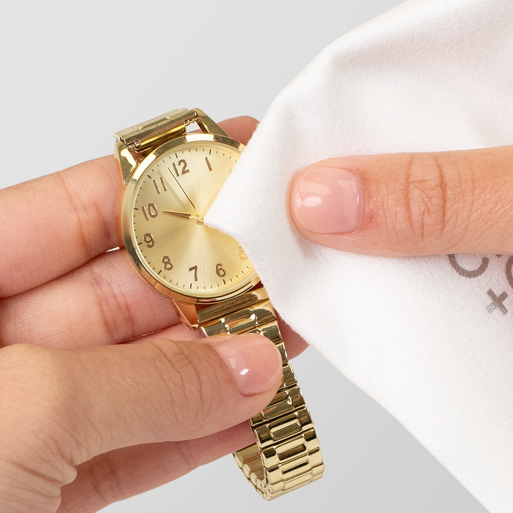 Microfiber cleaning cloth being used on a watch