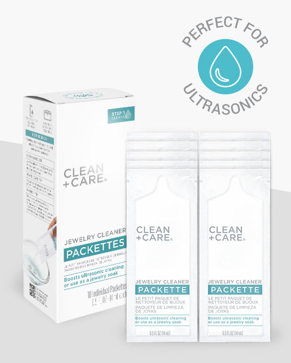 The CLEAN+CARE Jewelry Cleaner Packettes packaging next to the 10 individual Packettes included.