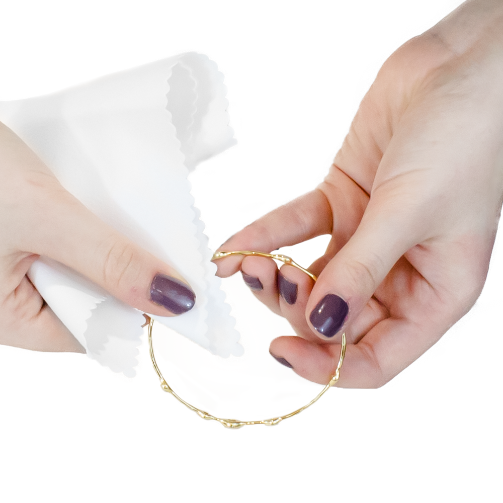 clean and care microfiber in use image cleaning a bracelet 